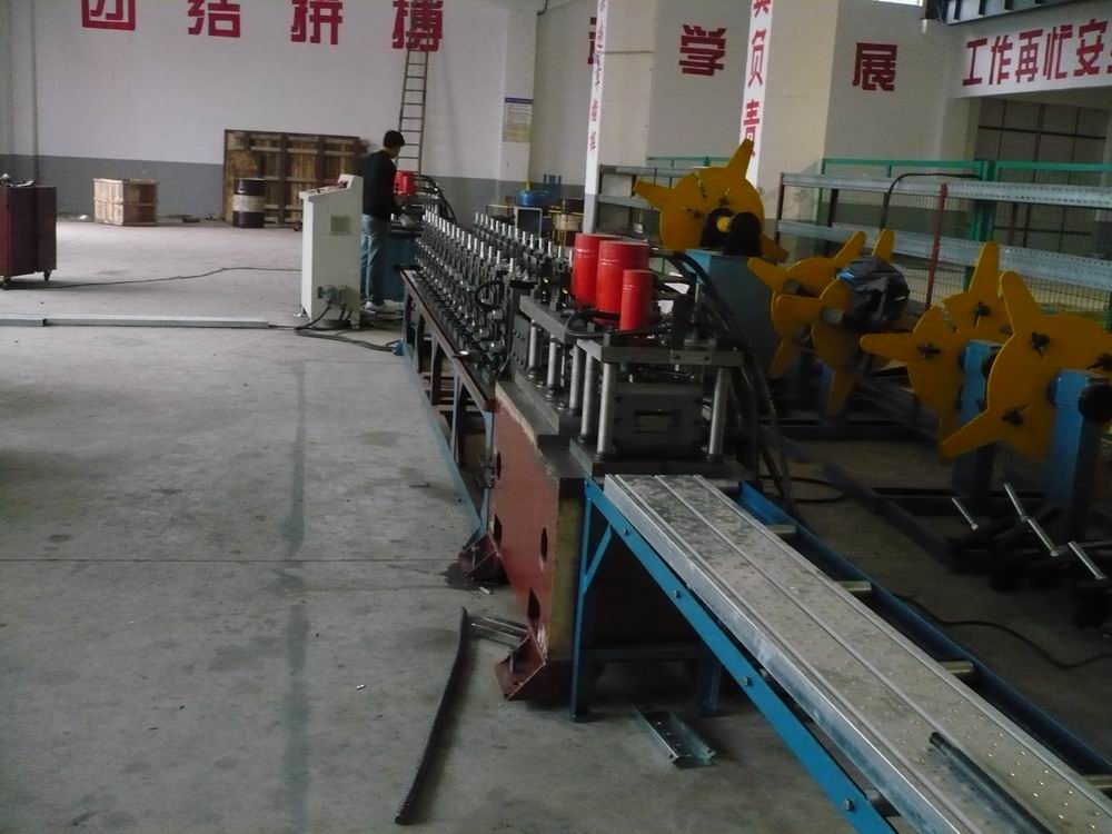 Vane damper roll forming machine