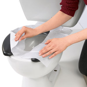 Disposable toilet seat paper cover