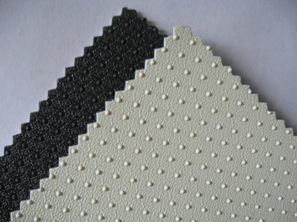 Double side textured geomembrane