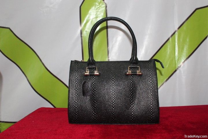 snakeskin-patterned leather handbag