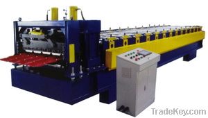 Tile roof panel forming machine