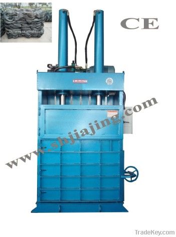 Hydraulic tire baler