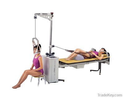 microcomputer controlled physical therapy traction bed