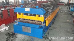 Colored wall panel forming machine