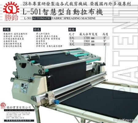 fabric spreading machine with cutter