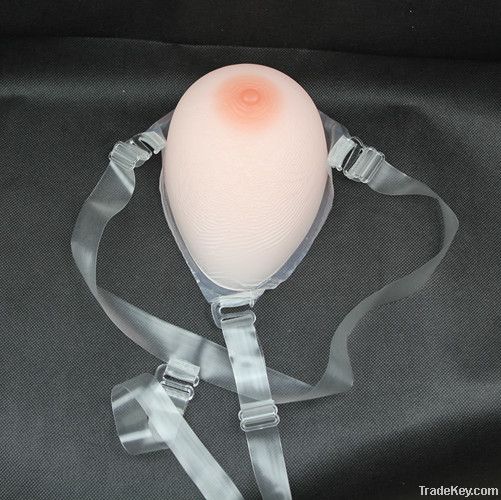 Unilateral teardrop silicon breast form for mastectomy with strap