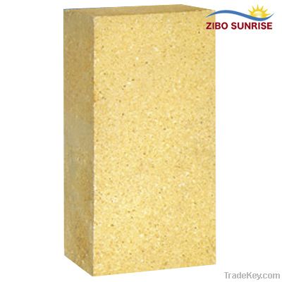 Large shaped refractory blocks for glass furnace