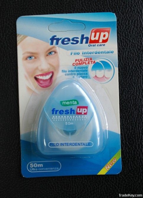 high quality 50m dental floss in a triangle shape container with a bli