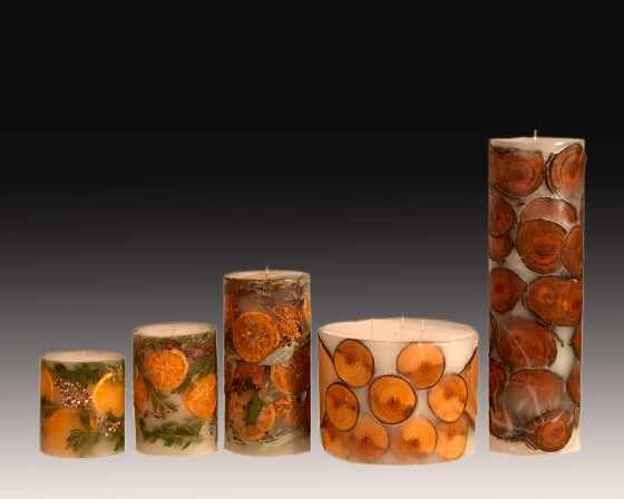 Artisan candle filled in dried frutis,flowers, wood