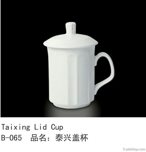 white porcelain cup with lid