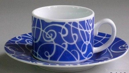 ceramic cup and saucers