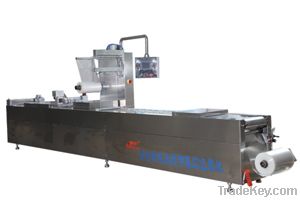 Fully automatic continuous tension vacuum packing machine