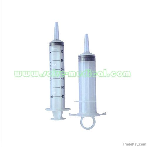 Irrigation syringe
