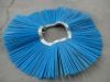 Brush cleaner for pavement sweeping machine