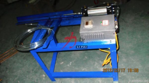 Small automatic feeder with induction bolts heater