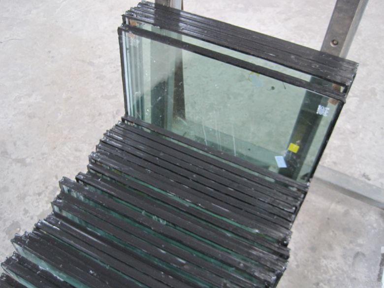 Insulating glass 6TP+12A+6TP for building glazing