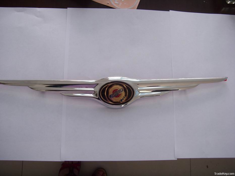 car emblem, car badge, chrome auto emblem