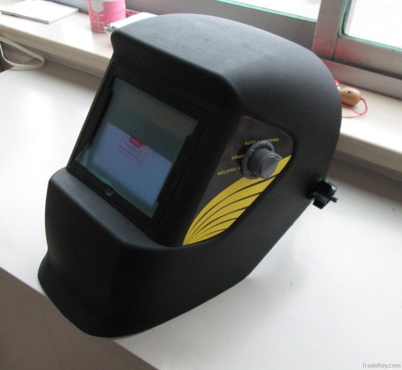 Auto darkening welding helmet