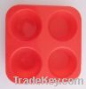 Four holds silicone mold for baking