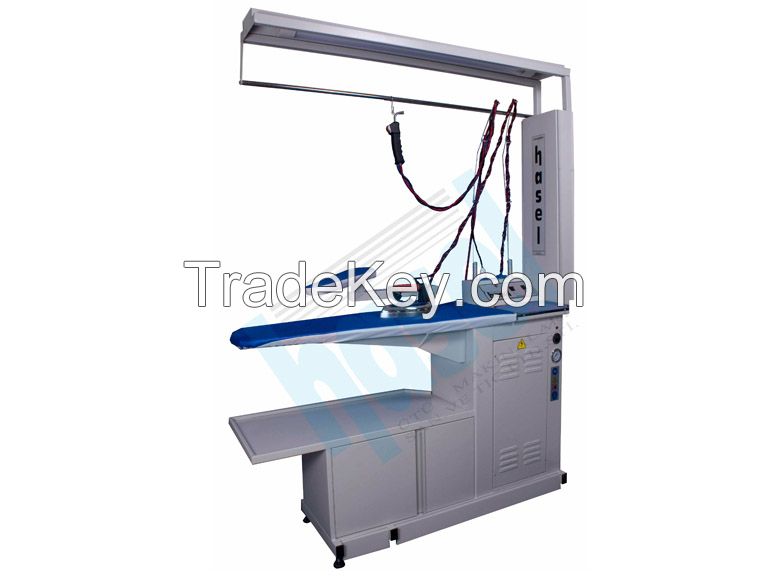 Vacuum ironing table with in boiler