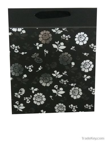 Promotional paper carrier bag with silver stamping flowers