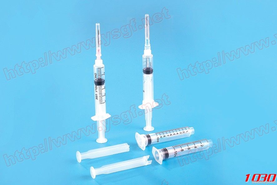 Disposable retractable safety syringe
