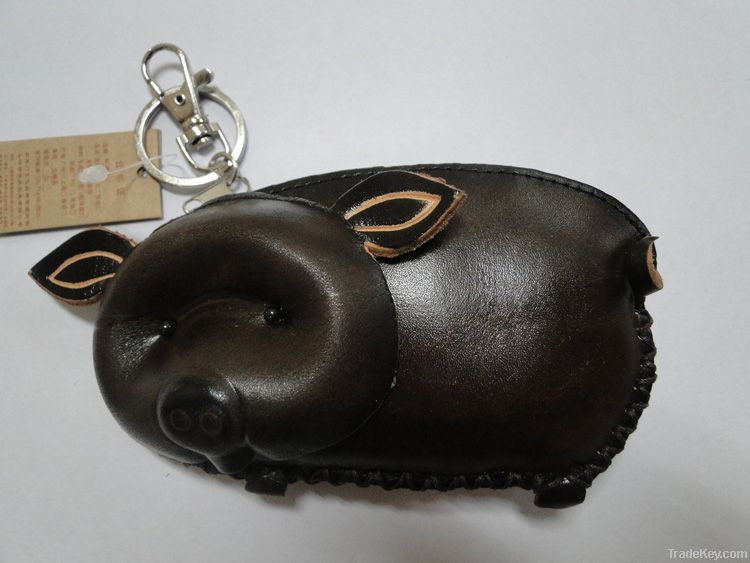 pig-featured leather purse