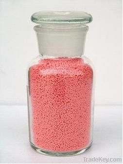 Pink speckles for detergent powder