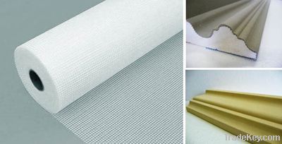 Adhesive mesh for foam moulding
