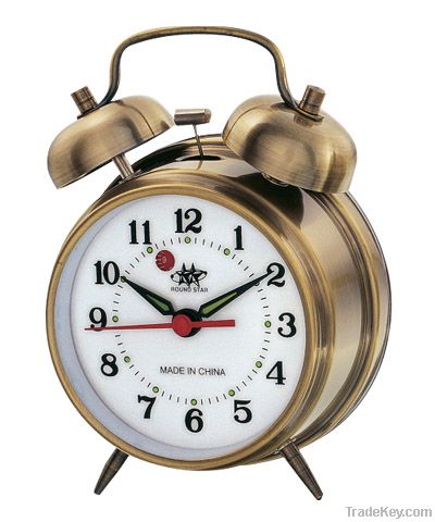 Quartz or Mechanical alarm clocks