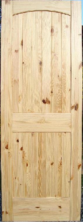 Interior Knotty Pine Door with V grooved panels and arch top