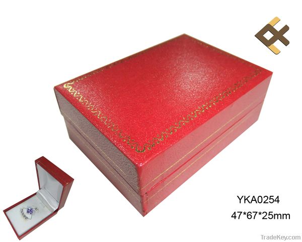 Red plastic gift box with gold trim