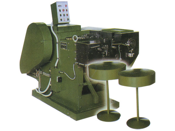 cold heading machine for bi-metallic contact rivets