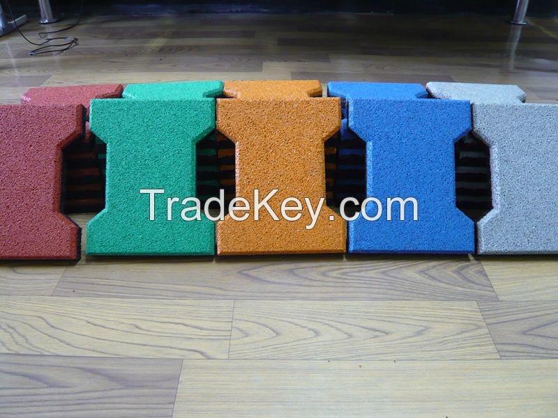 Dog-bone shape rubber tiles