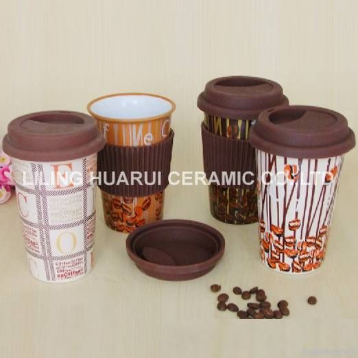 Ceramic coffee mug with silicone lid and sleeve