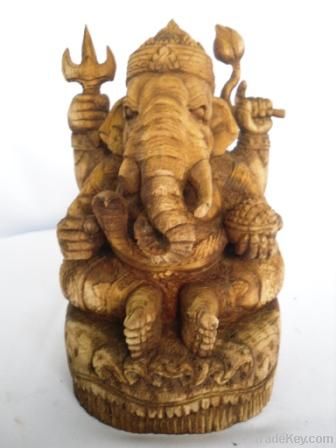 Hand-carved figure of the elephant god Thipanet, sitting, teak, height