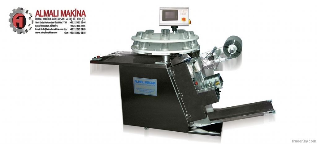 ALM-2040 SEMI AUTOMATIC 60 DEGREE ASLOPE  PACKAGING MACHINE