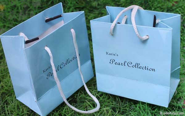 simple paper shopping , promotional bag in kraft , white cardboard