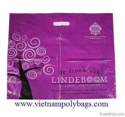 Violet LDPE with biodegradable  die cut patch handle bag