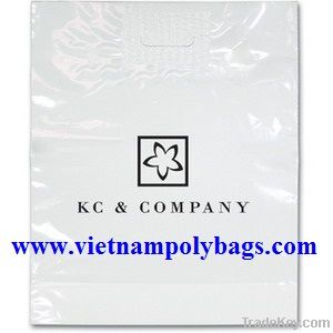 White LDPE with biodegradable die cut patch handle bag