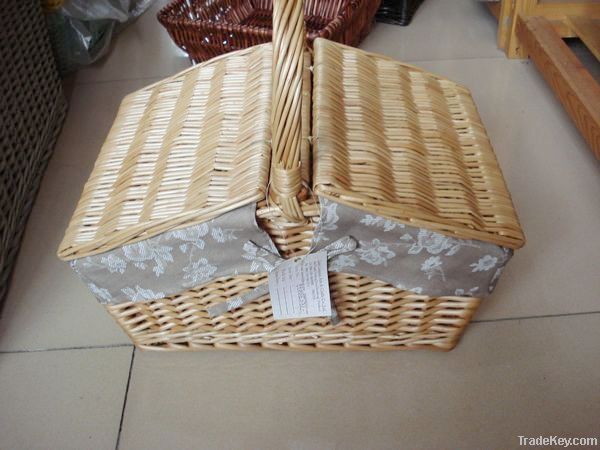 Empty wicker gift basket with handle and lid