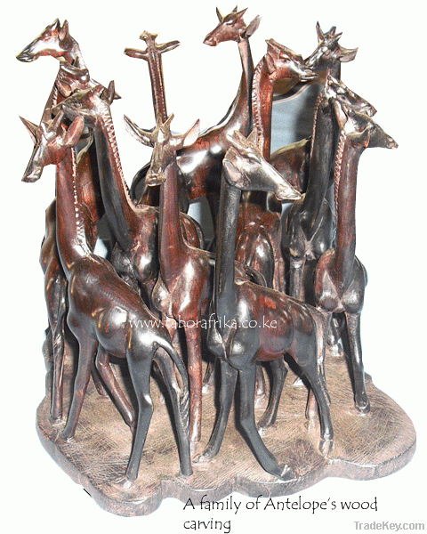 Antelope family wood carving