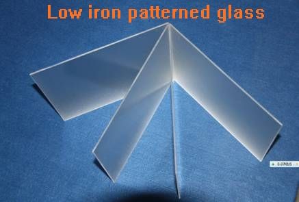Low iron patterned solar glass