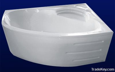 Corner bathtub with skirt panel drainer