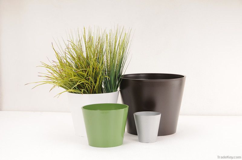 plastic, wood and stone flower pot
