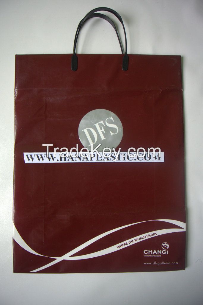 Rigid handle plastic bags