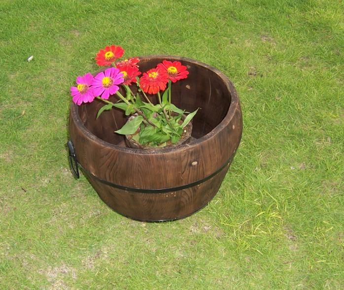 wooden planter/barrel with different designs