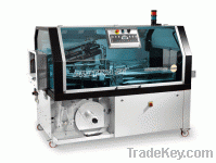 Fully automatic shrink wrapping m/c