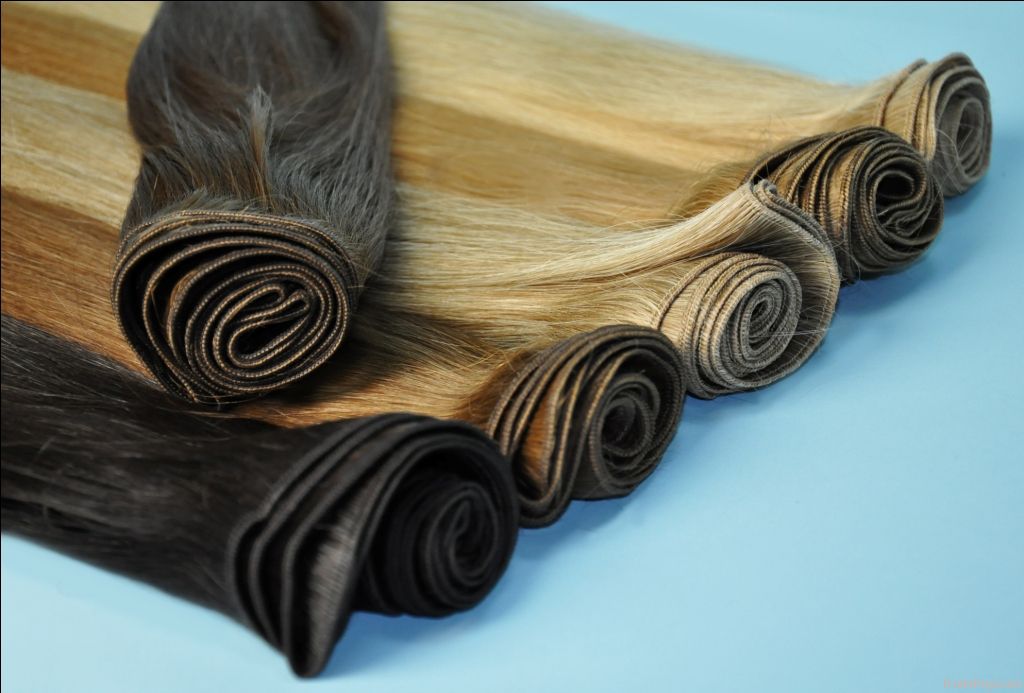 Hair for extension in wefts