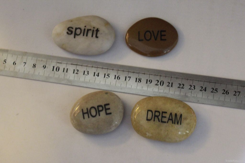 engraved pebble stone, bespoke stone, with patterns or words